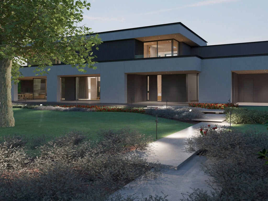 Vista serale dal giardino di un'abitazione moderna a Treviso